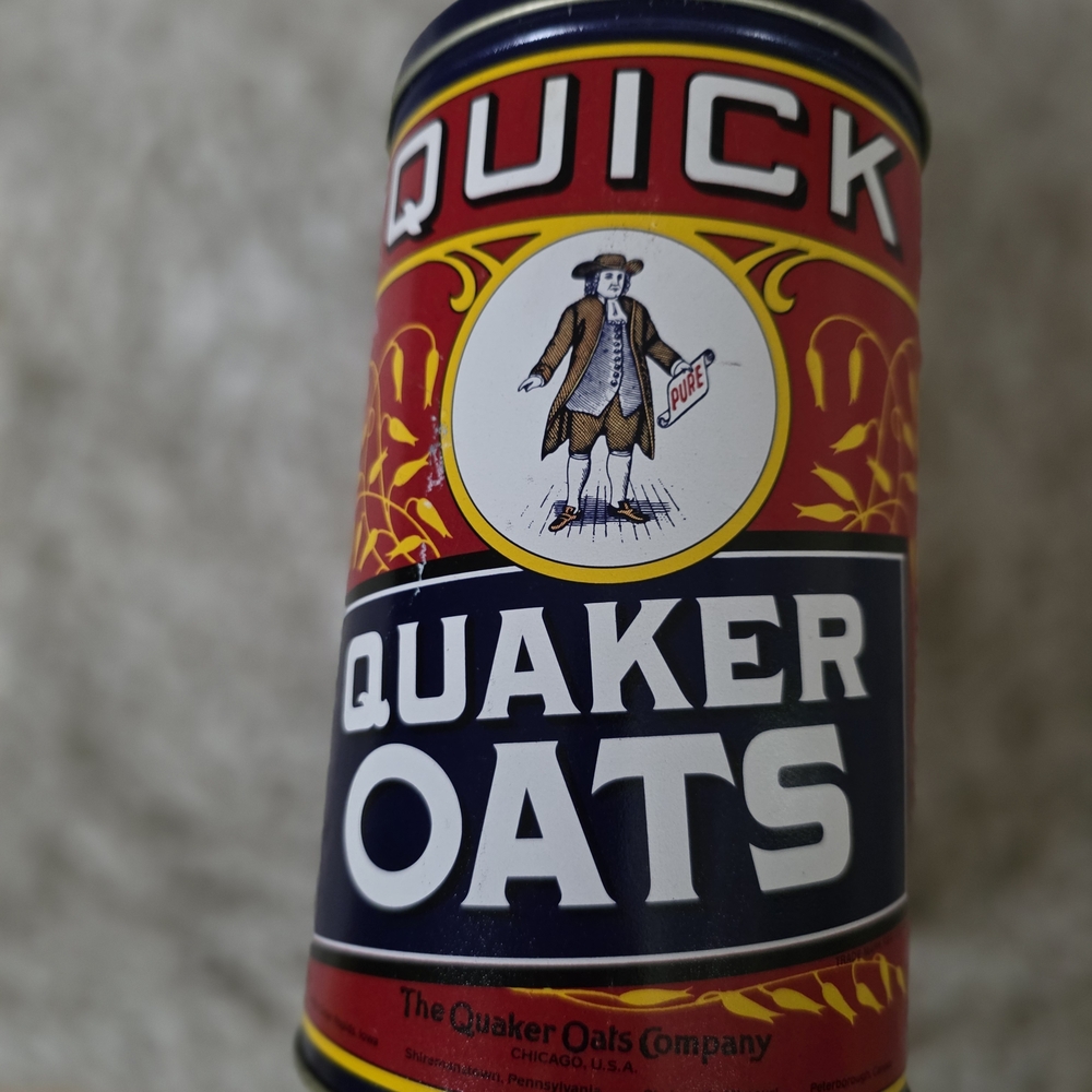 Antique Quaker Oats Canister with Blue and Yellow Design